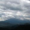 Dark clouds swirling around the mountains