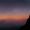 Watching the first colors of dawn after an hour of hiking in the dark