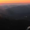 Mountains, clouds, mist, and new sun