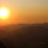 The warm sun breaks the sky