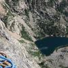 Watching the wind blast over dream lake from our tiny belay perch