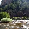 Looking up at the Crystal Wall, the river is flowing like June