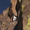 Kate working out some of the tricky moves of Upper Kor's Crack (5.9)