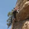 Kate pulling the little roof on 'From Russia with Love' (5.10a)