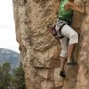 Liz cruising Fire It Up (5.10a/b)