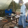 Cooking dinner Saturday night.  Check out the sweet tarp set up, for shade and rain protection!