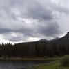 Clouds pour over the mountains in the afternoon