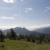 Clouds on the plains wash up on the mountains