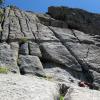 Mark moves the belay up onto the wrong side of Fang ledge