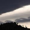 Wave clouds breaking over the mountains
