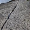 Looking up the fine crack that is the third pitch of the climb