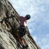 Adam leads an unknown climb (somewhere between 5.9 and 5.11, most likely)
