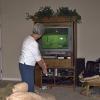 Kathy plays golf on the Wii