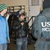 Workers from the lab talk to some students