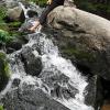 Mark at the stream crossing, resting painful feet