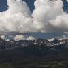 Bigger clouds building over the distant mountains