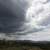 Big dark clouds form overhead