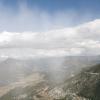 Snow blowing and falling across the valley