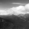 Clearing skies and snowy peaks