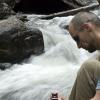 Mark filters water from the very full stream