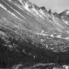 Hikers enjoy views of Long's peak and the Keyboard of the Winds