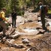 Crossing a flooded section of the trail