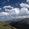 Trail ridge road winds around some tall mountains