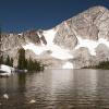 Snow still covers the banks of lake Marie