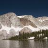 Lake Marie sits below the granite face of Medicine Bow Peak