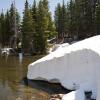 10ft of snow still cover the banks of Mirror lake this summer