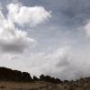 Blustery day blowing clouds over the ridge