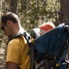 Mark and Gabe hiking through a ponderosa pine forest
