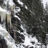 Ice, cliffs, trees, and mountains