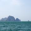 Passing limestone karsts in the distance