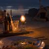 The remains of our dinner and sunset on a warm, beautiful beach