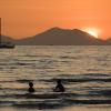 Swiming at sunset