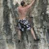 Mark climbing in swimtrunks