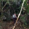 Kate hiking up to the Thaiwand Wall through the jungle