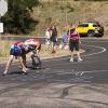Spectators write on the road