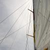 Hauling up the mainsail for our big Catamaran