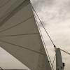 Sailing home under cloudy and breezy skies