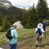 The family hiking through the mountains