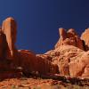 Looking up at a clear sky and lovely rocks