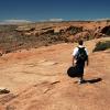 TJ hikes out with our camera equipment