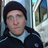 TJ outside the RV in the morning
